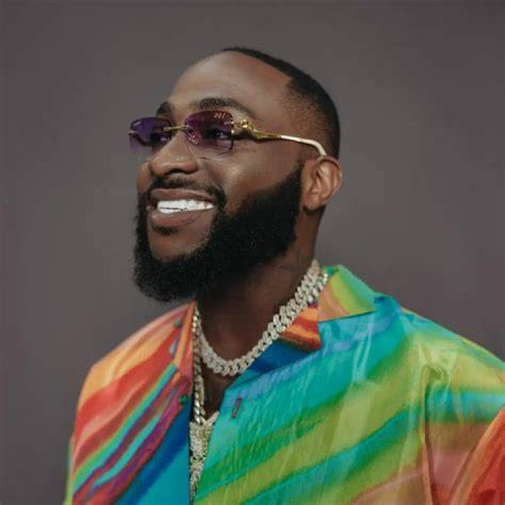 
Davido, Destiny Etiko, Others React As Cubana Chief Priest Shares Video Of His Son Sucking His N!pple 